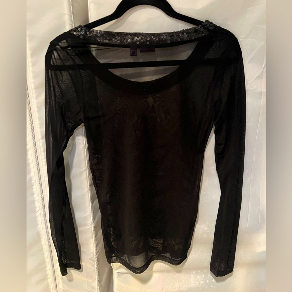 Sheer black evening too with Sequined collar.